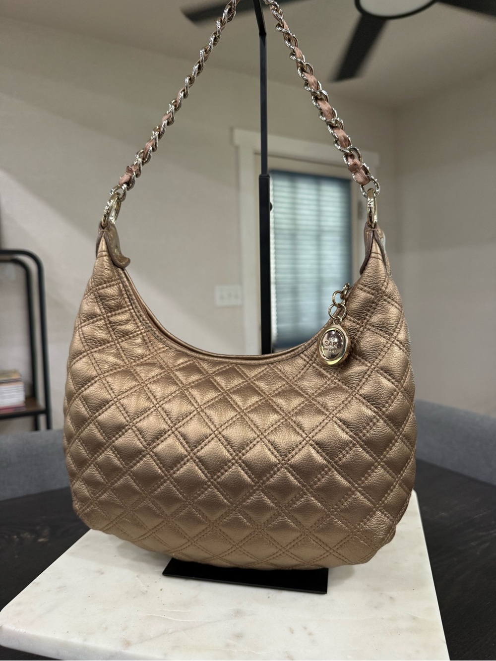The Sak Quilted Metallic Bronze Shoulder Bag with Chain Strap